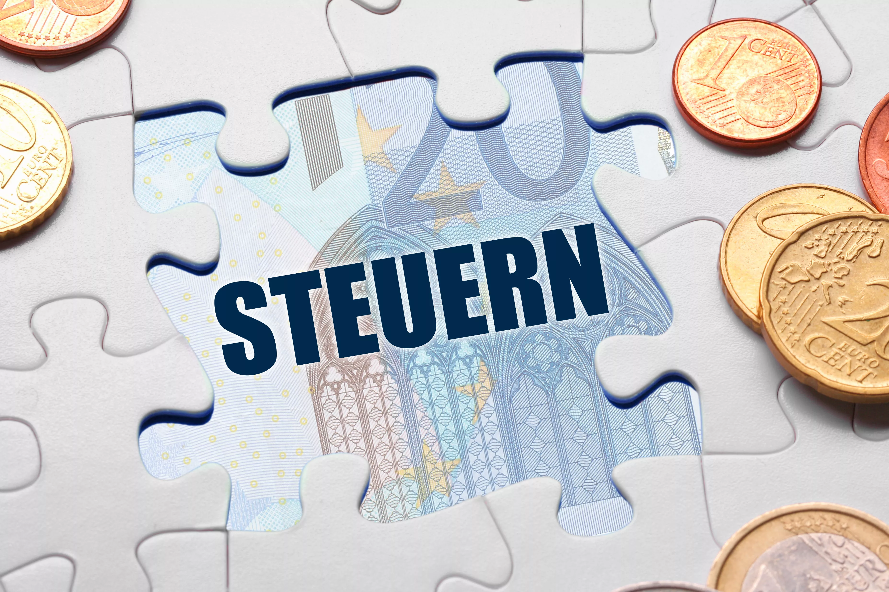 Geld, Puzzle und Steuern